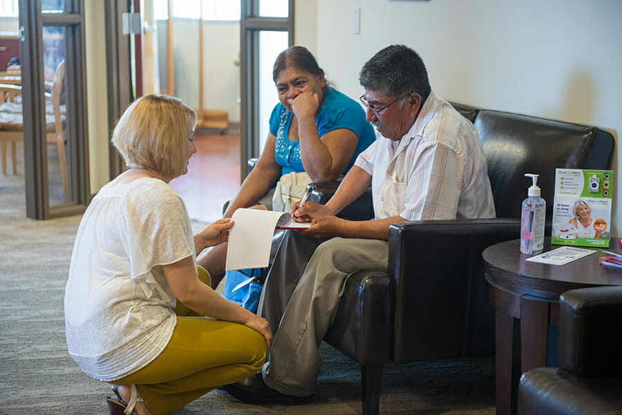 Doctor talking to patients